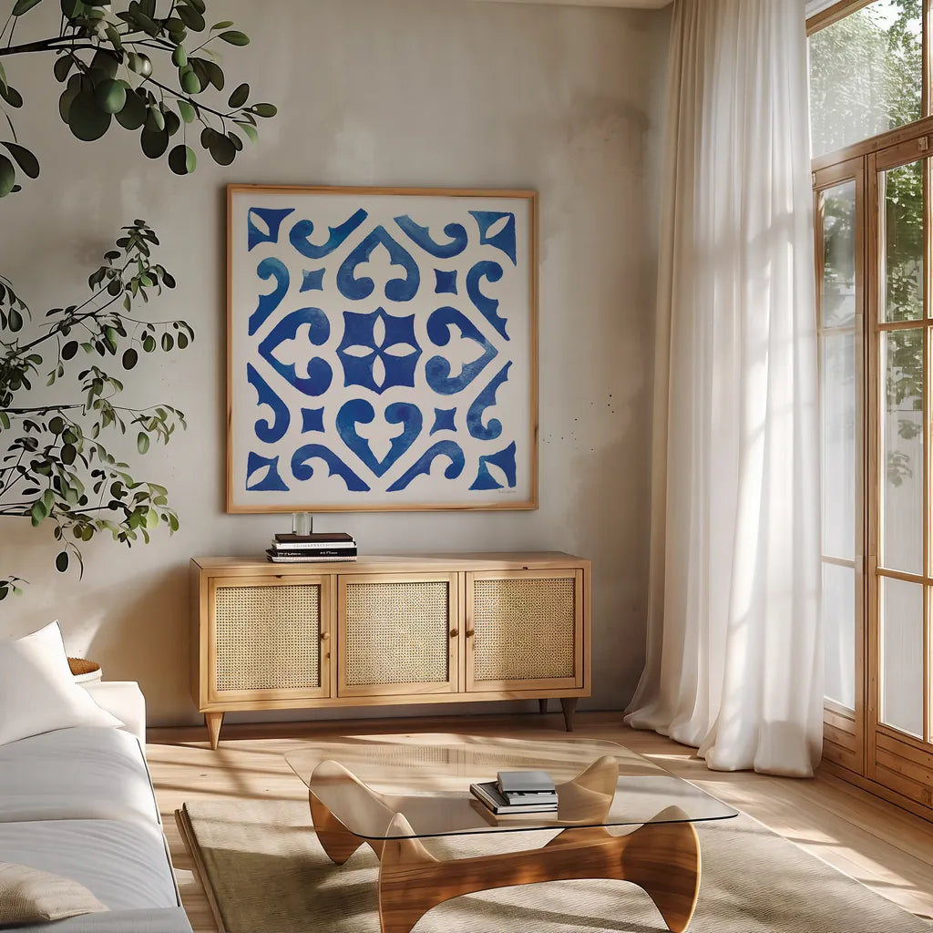 Andalusian Tile I by Mercedes Lopez Charro. Shown in a natural wood frame in a cozy modern living room. Available as an archival giclee rolled canvas, fine art paper, or poster print. SKU 68805a.