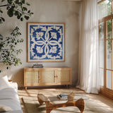 Andalusian Tile III by Mercedes Lopez Charro. Shown in a natural wood frame in a cozy modern living room. Available as an archival giclee rolled canvas, fine art paper, or poster print. SKU 68807a.