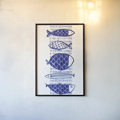 Blue Fish I by Mercedes Lopez Charro. shown as a paper print in a black flame. Available as a archival giclee rolled canvas, fine art paper, or poster print. SKU 77493h.