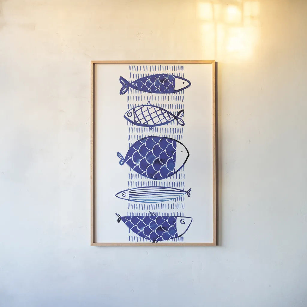 Blue Fish I by Mercedes Lopez Charro. shown as a paper print in a natural frame. Available as a archival giclee rolled canvas, fine art paper, or poster print. SKU 77493h.