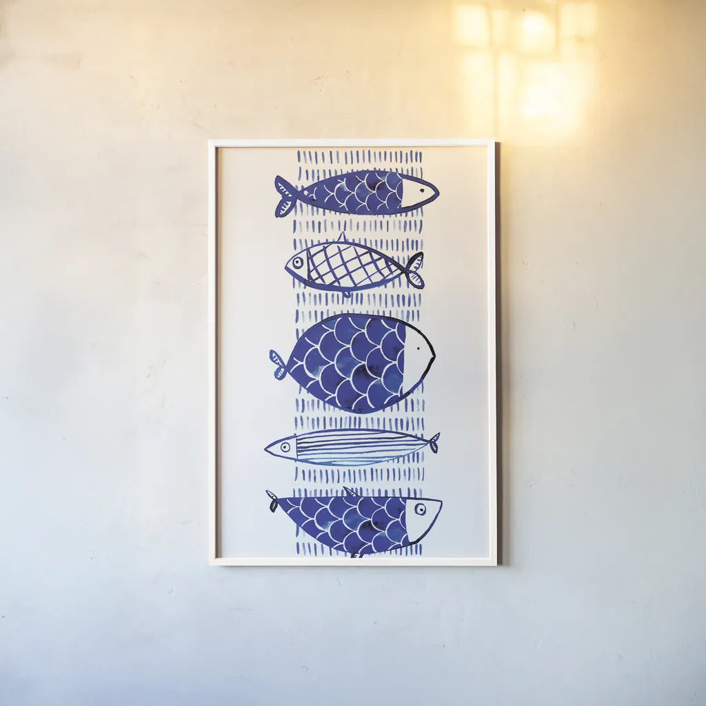 Blue Fish I by Mercedes Lopez Charro. shown as a paper print in a white frame. Available as a archival giclee rolled canvas, fine art paper, or poster print. SKU 77493h.