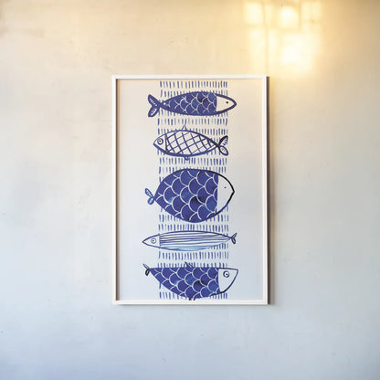 Blue Fish I by Mercedes Lopez Charro. shown as a paper print in a white frame. Available as a archival giclee rolled canvas, fine art paper, or poster print. SKU 77493h.