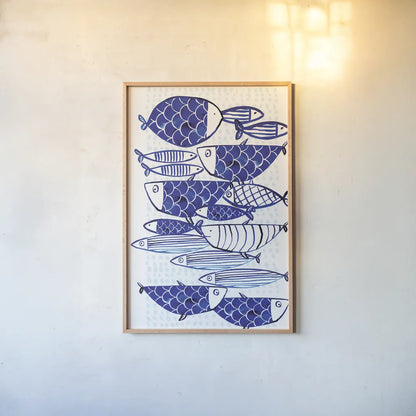 Blue Fish III by Mercedes Lopez Charro. shown as a paper print in a natural frame. Available as a archival giclee rolled canvas, fine art paper, or poster print. SKU 77495h.