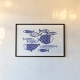 Blue Fish IV by Mercedes Lopez Charro. shown as a paper print in a black flame. Available as a archival giclee rolled canvas, fine art paper, or poster print. SKU 79252i.