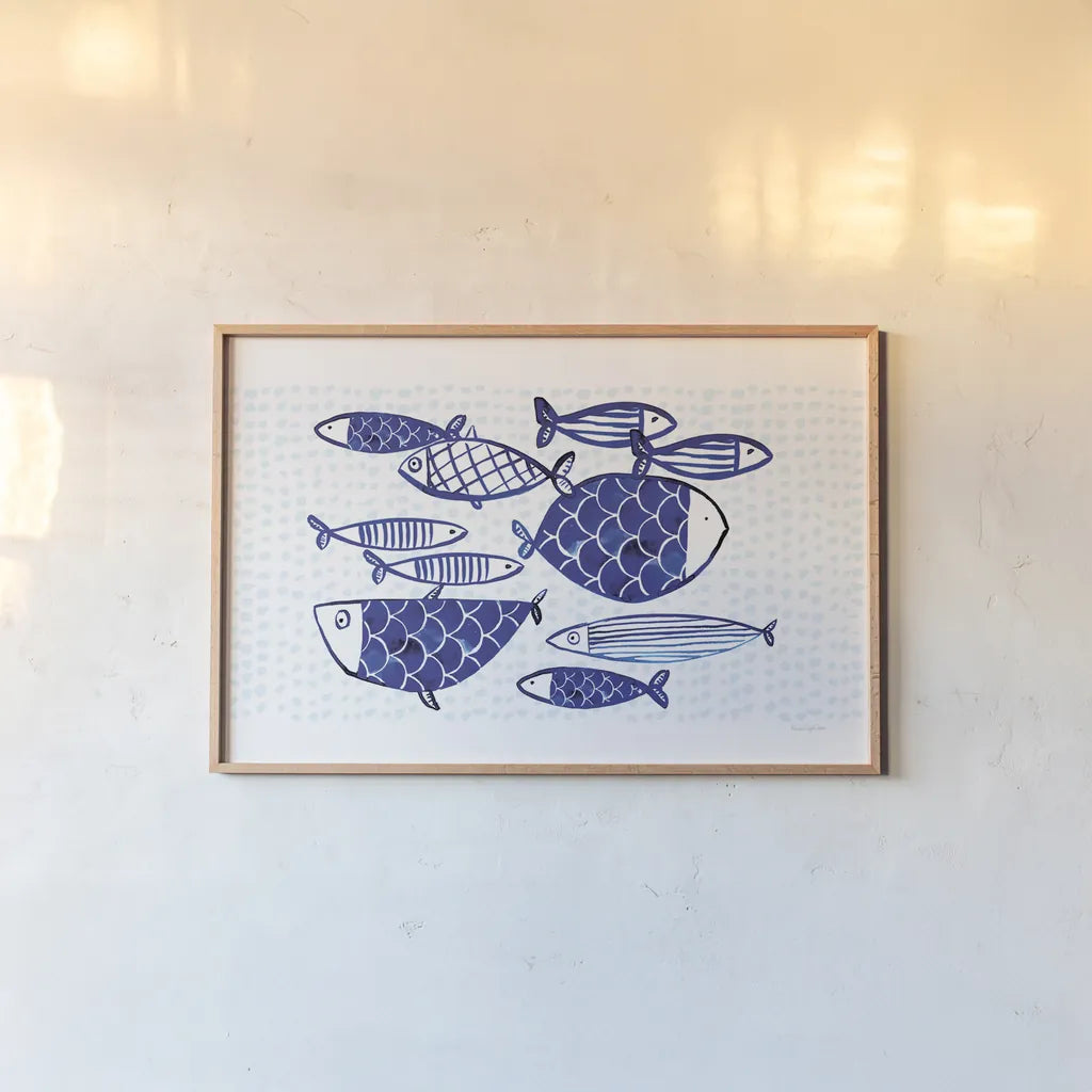 Blue Fish IV by Mercedes Lopez Charro. shown as a paper print in a natural frame. Available as a archival giclee rolled canvas, fine art paper, or poster print. SKU 79252i.