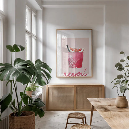 Cheers I on White v2 by Mercedes Lopez Charro. shown as a print in a natural wood frame in a dining room. Available as a archival giclee rolled canvas, fine art paper, or poster print. SKU 91307h.