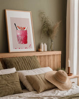 Cheers I on White v2 by Mercedes Lopez Charro. shown as a paper print in a natural frame. Available as a archival giclee rolled canvas, fine art paper, or poster print. SKU 91307h.