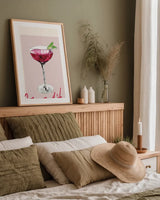Cheers II by Mercedes Lopez Charro. shown as a paper print in a natural frame. Available as a archival giclee rolled canvas, fine art paper, or poster print. SKU 85673h.