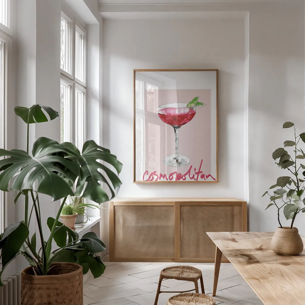 Cheers II on White v2 by Mercedes Lopez Charro. shown as a print in a natural wood frame in a dining room. Available as a archival giclee rolled canvas, fine art paper, or poster print. SKU 91308h.