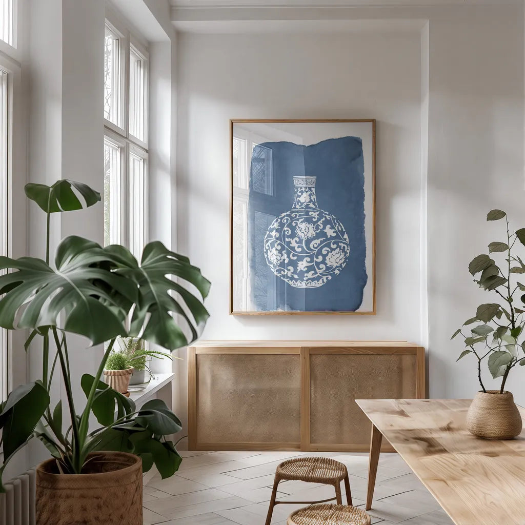 Chinese Vase I by Mercedes Lopez Charro. shown as a print in a natural wood frame in a dining room. Available as a archival giclee rolled canvas, fine art paper, or poster print. SKU 64226h.