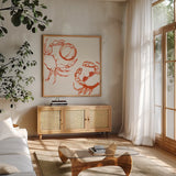 Coastal Crabs Beach Fun by Mercedes Lopez Charro. Shown in a natural wood frame in a cozy modern living room. Available as an archival giclee rolled canvas, fine art paper, or poster print. SKU 102551a.