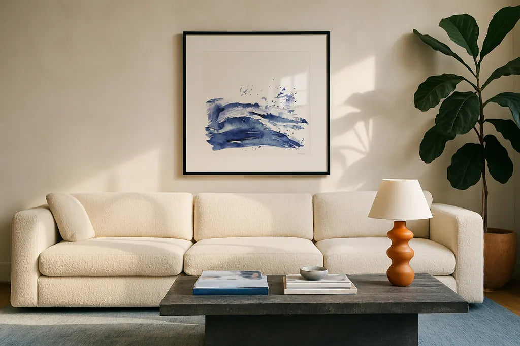 Coastal Splash I by Mercedes Lopez Charro. Displayed in a glass frame with matte in a clean modern living room. Available as an archival giclee rolled canvas, fine art paper, or poster print. SKU 64830a.
