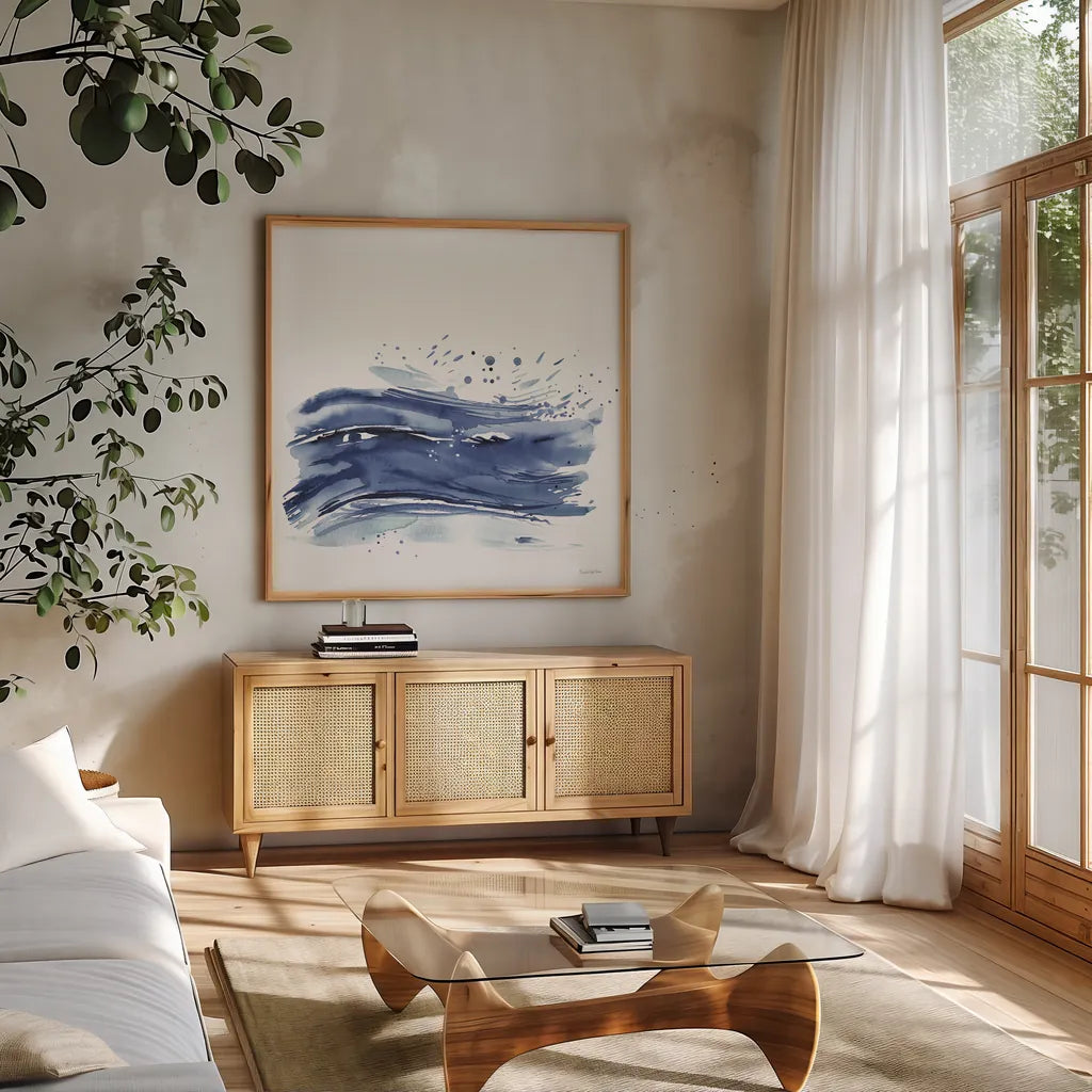 Coastal Splash II by Mercedes Lopez Charro. Shown in a natural wood frame in a cozy modern living room. Available as an archival giclee rolled canvas, fine art paper, or poster print. SKU 64831a.