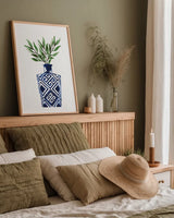 Cobalt Geometric Vases III by Mercedes Lopez Charro. shown as a paper print in a natural frame. Available as a archival giclee rolled canvas, fine art paper, or poster print. SKU 67374h.