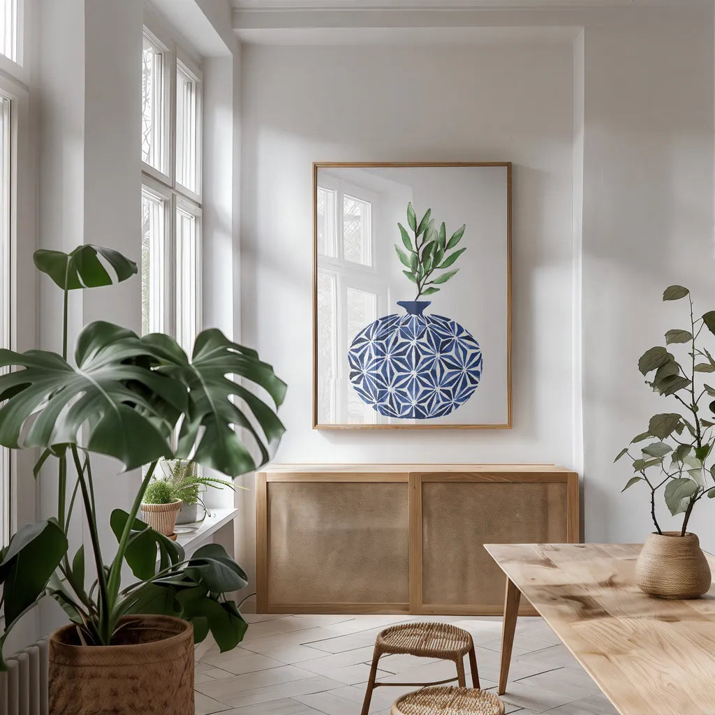 Cobalt Geometric Vases IV by Mercedes Lopez Charro. shown as a print in a natural wood frame in a dining room. Available as a archival giclee rolled canvas, fine art paper, or poster print. SKU 67375h.