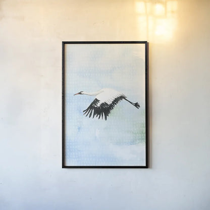 Crane in Flight II by Mercedes Lopez Charro. shown as a paper print in a black flame. Available as a archival giclee rolled canvas, fine art paper, or poster print. SKU 77498h.