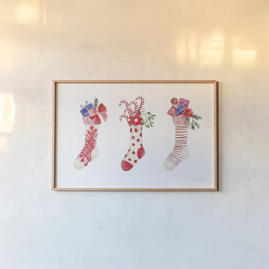 Decked Out Stockings by Mercedes Lopez Charro. shown as a paper print in a natural frame. Available as a archival giclee rolled canvas, fine art paper, or poster print. SKU 77101i.