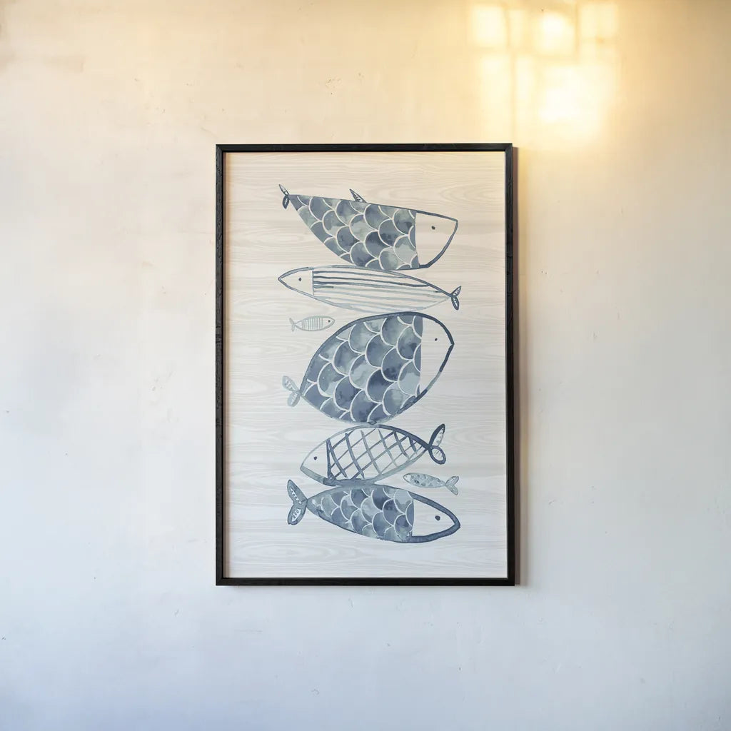 Driftwood Blue Fish I by Mercedes Lopez Charro. shown as a paper print in a black flame. Available as a archival giclee rolled canvas, fine art paper, or poster print. SKU 82296h.