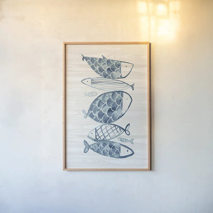 Driftwood Blue Fish I by Mercedes Lopez Charro. shown as a paper print in a natural frame. Available as a archival giclee rolled canvas, fine art paper, or poster print. SKU 82296h.