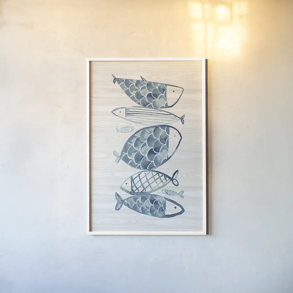Driftwood Blue Fish I by Mercedes Lopez Charro. shown as a paper print in a white frame. Available as a archival giclee rolled canvas, fine art paper, or poster print. SKU 82296h.