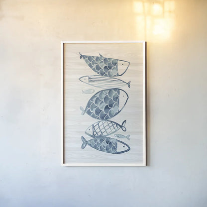 Driftwood Blue Fish I by Mercedes Lopez Charro. shown as a paper print in a white frame. Available as a archival giclee rolled canvas, fine art paper, or poster print. SKU 82296h.