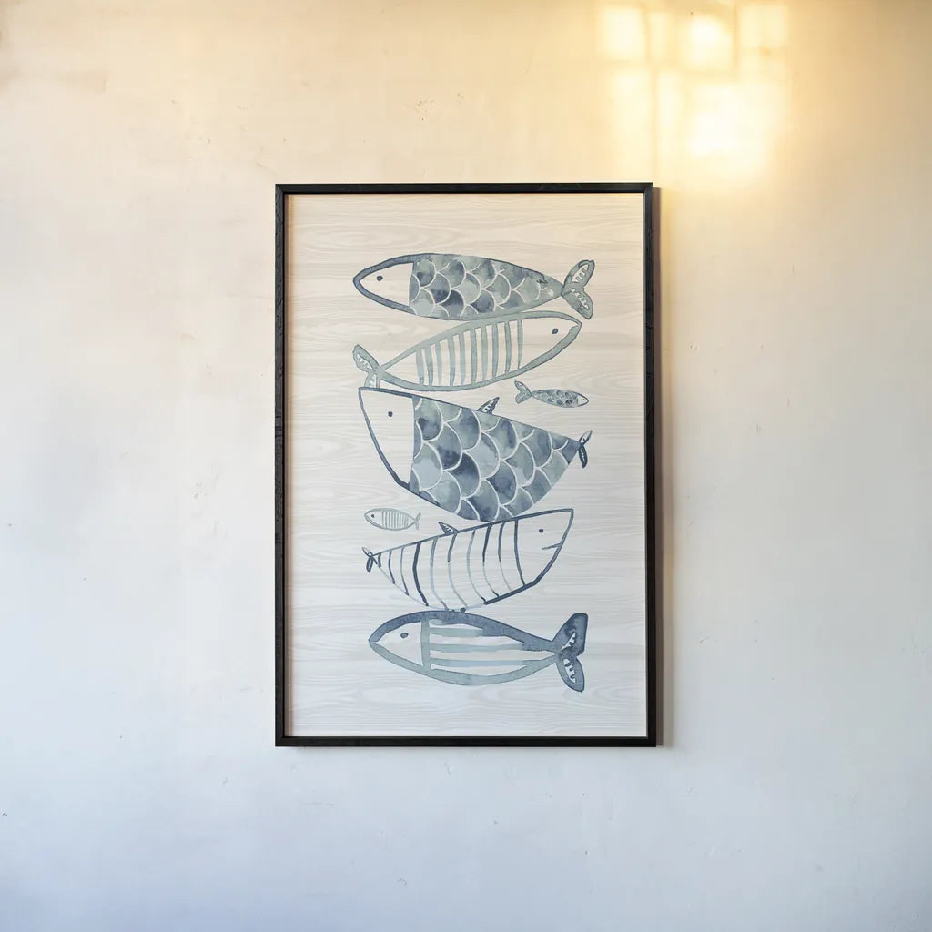 Driftwood Blue Fish II by Mercedes Lopez Charro. shown as a paper print in a black flame. Available as a archival giclee rolled canvas, fine art paper, or poster print. SKU 82297h.