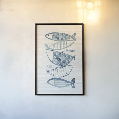 Driftwood Blue Fish II by Mercedes Lopez Charro. shown as a paper print in a black flame. Available as a archival giclee rolled canvas, fine art paper, or poster print. SKU 82297h.