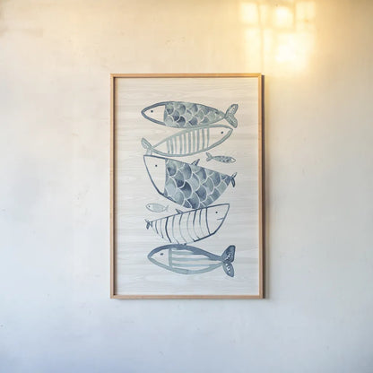 Driftwood Blue Fish II by Mercedes Lopez Charro. shown as a paper print in a natural frame. Available as a archival giclee rolled canvas, fine art paper, or poster print. SKU 82297h.