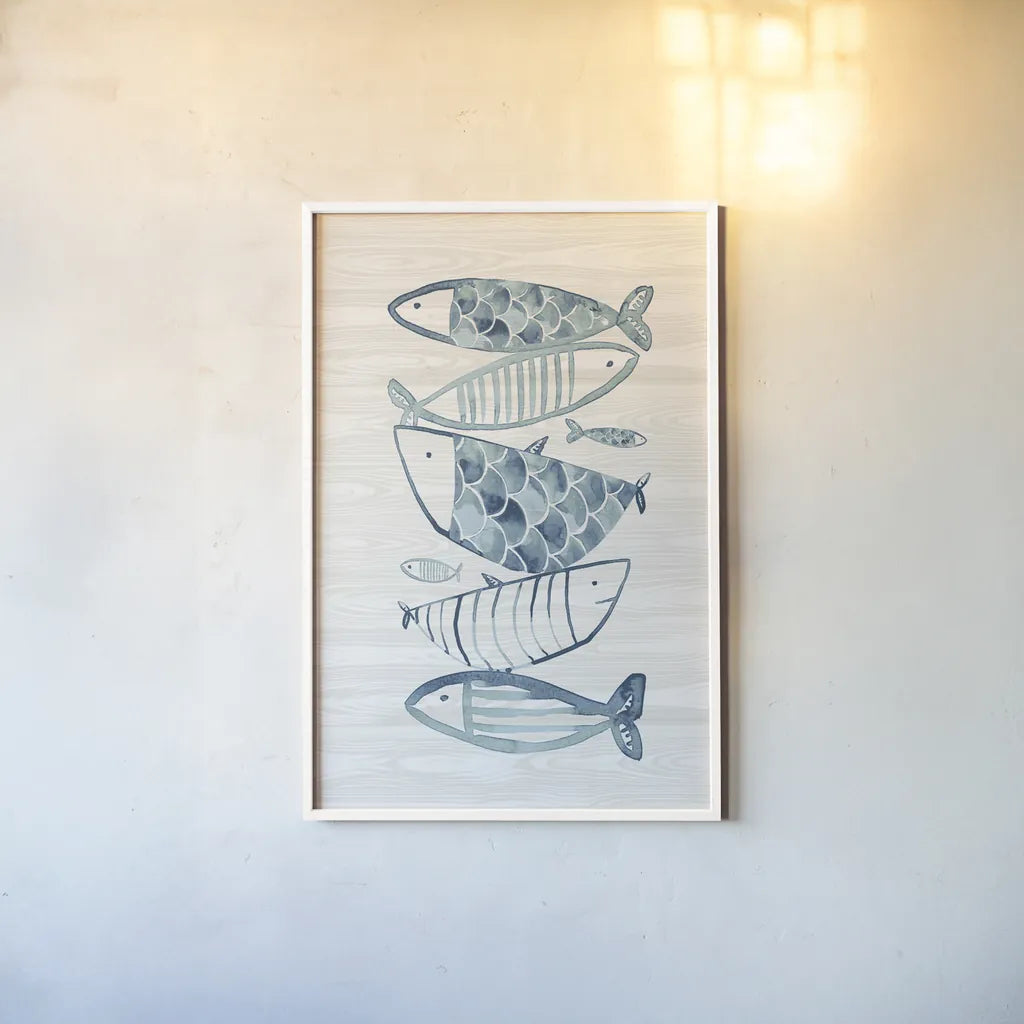Driftwood Blue Fish II by Mercedes Lopez Charro. shown as a paper print in a white frame. Available as a archival giclee rolled canvas, fine art paper, or poster print. SKU 82297h.