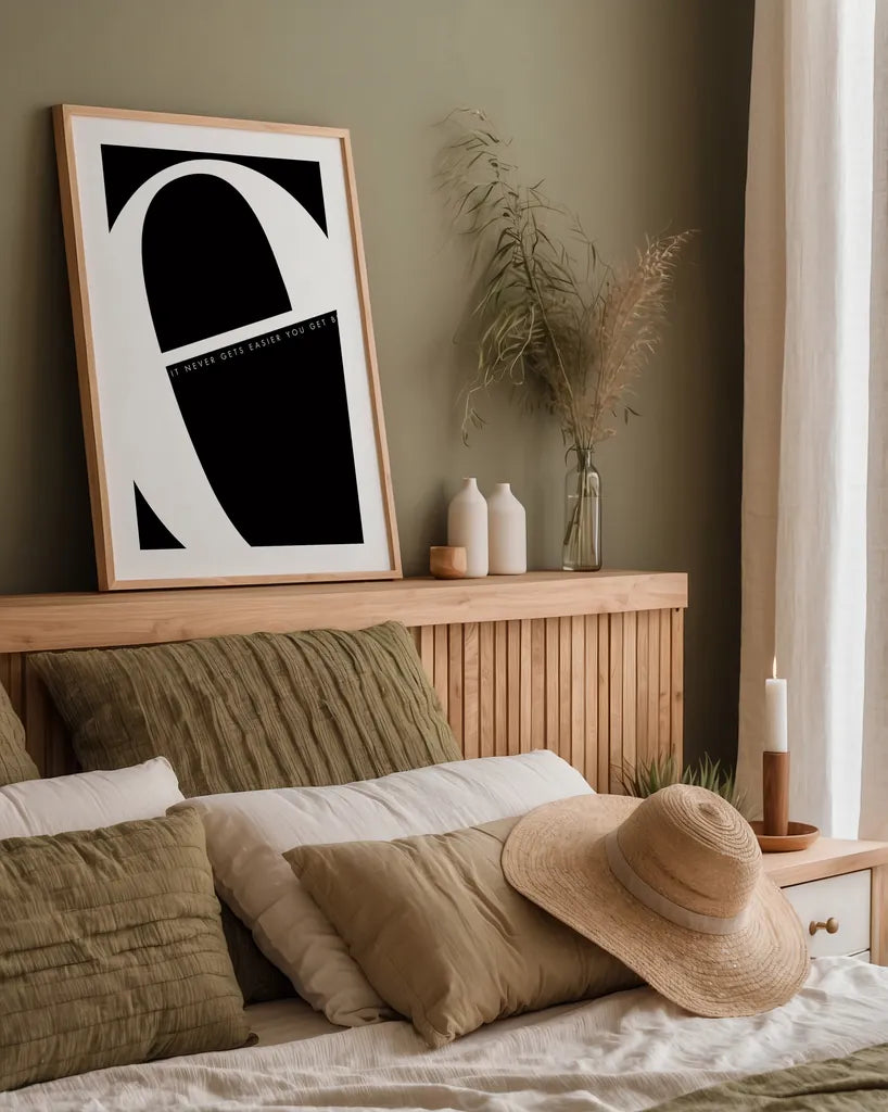 E is for Easier by Mercedes Lopez Charro. shown as a paper print in a natural frame. Available as a archival giclee rolled canvas, fine art paper, or poster print. SKU 64138h.