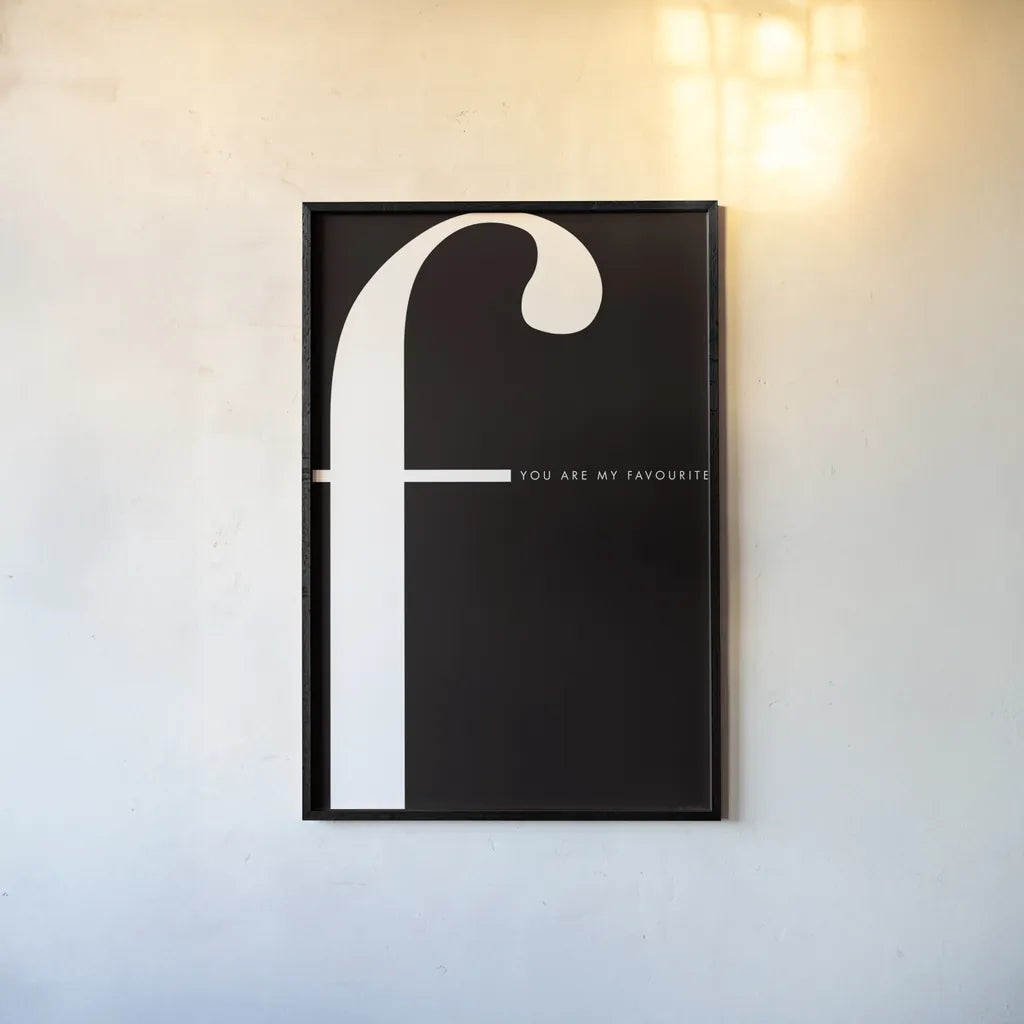 F is for Favourite by Mercedes Lopez Charro. shown as a paper print in a black flame. Available as a archival giclee rolled canvas, fine art paper, or poster print. SKU 64139h.