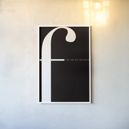 F is for Favourite by Mercedes Lopez Charro. shown as a paper print in a white frame. Available as a archival giclee rolled canvas, fine art paper, or poster print. SKU 64139h.