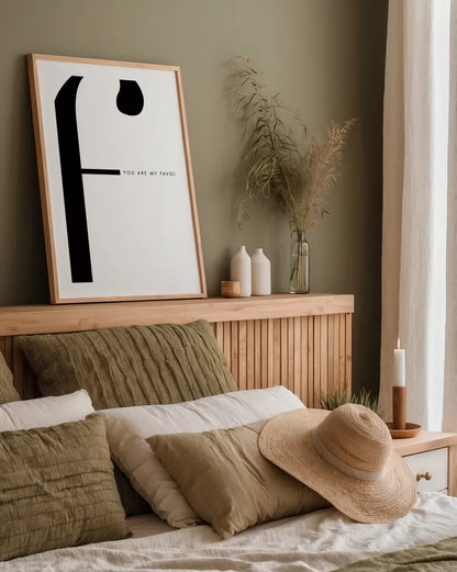 F is for favorite on White by Mercedes Lopez Charro. shown as a paper print in a natural frame. Available as a archival giclee rolled canvas, fine art paper, or poster print. SKU 64146h.