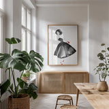 Fashion Debutante with Red by Mercedes Lopez Charro. shown as a print in a natural wood frame in a dining room. Available as a archival giclee rolled canvas, fine art paper, or poster print. SKU 68868h.