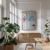 Feels Like Home by Mercedes Lopez Charro. shown as a print in a natural wood frame in a dining room. Available as a archival giclee rolled canvas, fine art paper, or poster print. SKU 102786h.