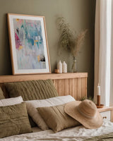 Feels Like Home by Mercedes Lopez Charro. shown as a paper print in a natural frame. Available as a archival giclee rolled canvas, fine art paper, or poster print. SKU 102786h.