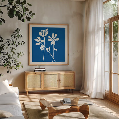 Fleurs de Matisse II Sq by Mercedes Lopez Charro. Shown in a natural wood frame in a cozy modern living room. Available as an archival giclee rolled canvas, fine art paper, or poster print. SKU 80610a.