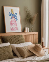 Flirty Champagne I by Mercedes Lopez Charro. shown as a paper print in a natural frame. Available as a archival giclee rolled canvas, fine art paper, or poster print. SKU 92817h.