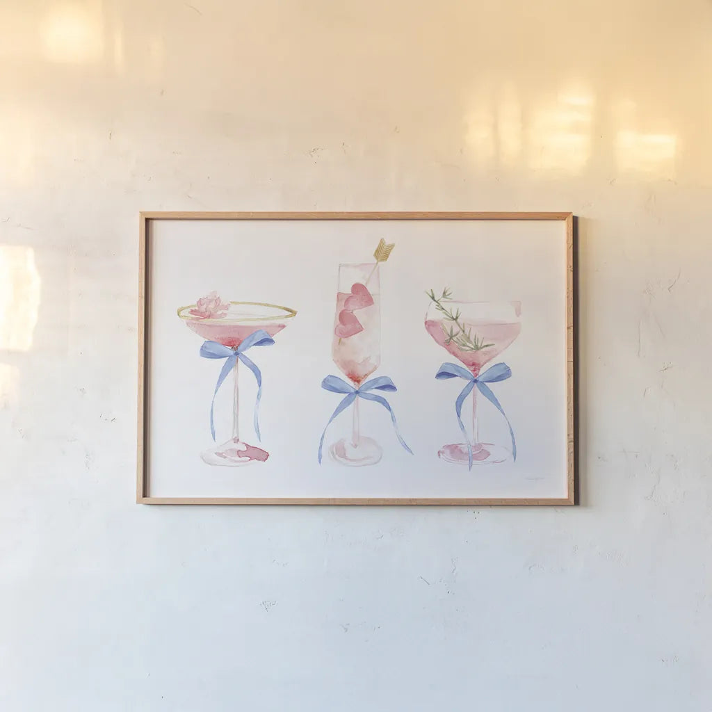 Flirty Champagne III by Mercedes Lopez Charro. shown as a paper print in a natural frame. Available as a archival giclee rolled canvas, fine art paper, or poster print. SKU 92819i.