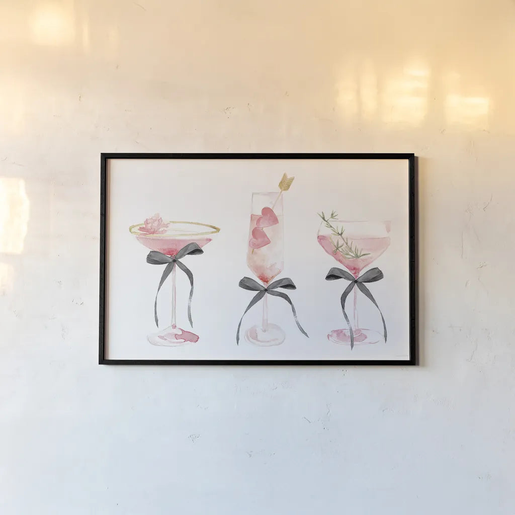 Flirty Champagne III Black Bows by Mercedes Lopez Charro. shown as a paper print in a black flame. Available as a archival giclee rolled canvas, fine art paper, or poster print. SKU 96871i.