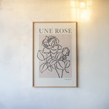French Flower Poster IV Bold by Mercedes Lopez Charro. shown as a paper print in a natural frame. Available as a archival giclee rolled canvas, fine art paper, or poster print. SKU 86100h.