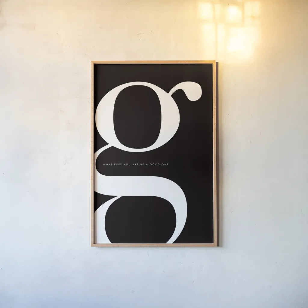 G is for Good by Mercedes Lopez Charro. shown as a paper print in a natural frame. Available as a archival giclee rolled canvas, fine art paper, or poster print. SKU 64140h.