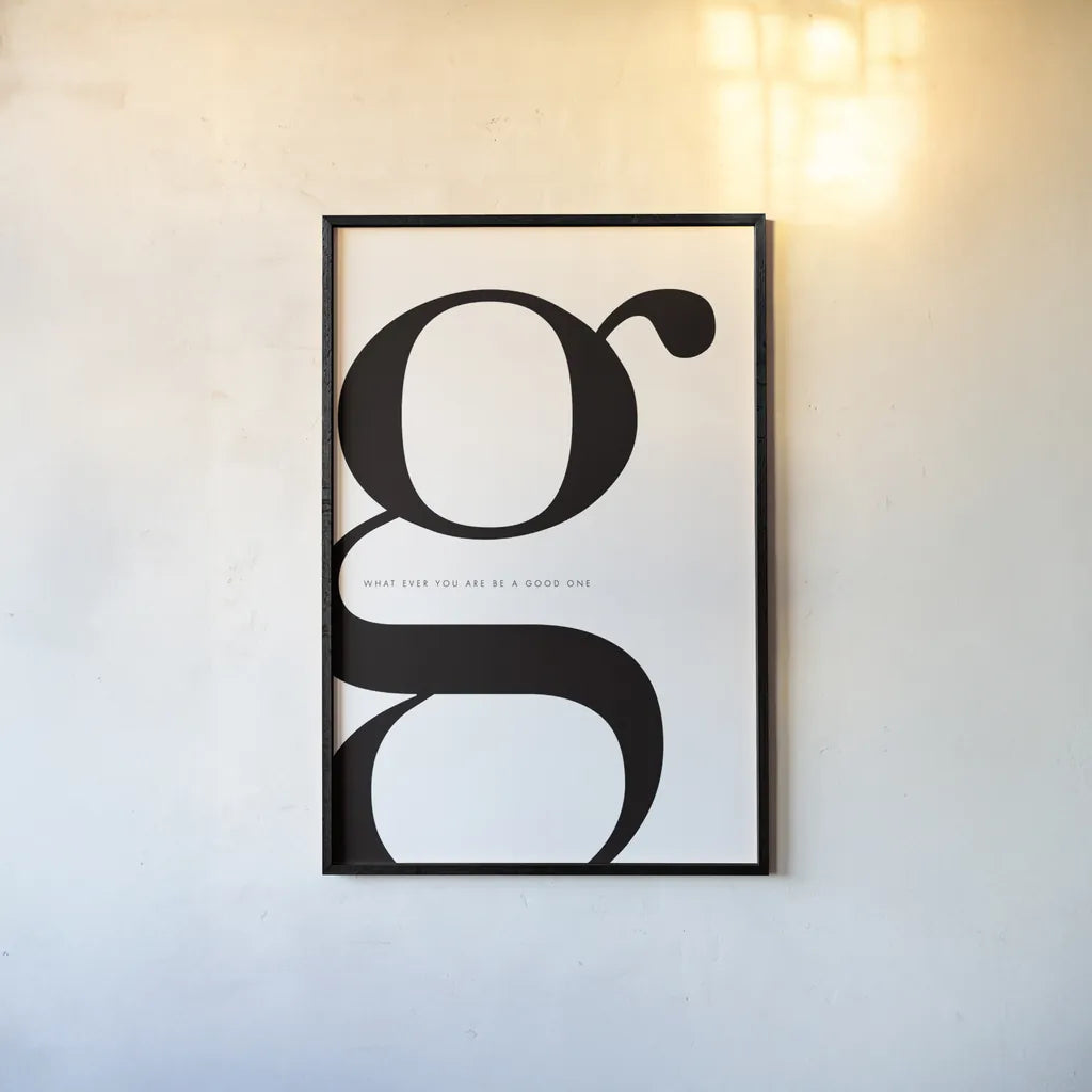 G is for Good on White by Mercedes Lopez Charro. shown as a paper print in a black flame. Available as a archival giclee rolled canvas, fine art paper, or poster print. SKU 64147h.