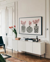 Geometric Vases I by Mercedes Lopez Charro. shown as a framed stretched canvas in a living room above a console. Available as a archival giclee rolled canvas, fine art paper, or poster print. SKU 64162i.