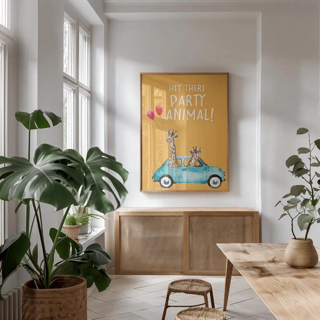 Giraffe Joy Ride III Birthday by Mercedes Lopez Charro. shown as a print in a natural wood frame in a dining room. Available as a archival giclee rolled canvas, fine art paper, or poster print. SKU 78200h.