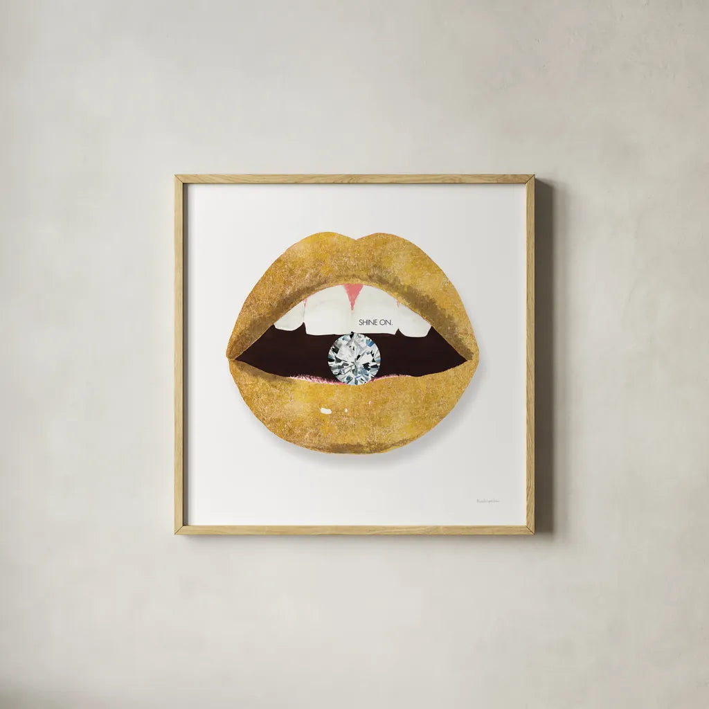 Gold Lips II by Mercedes Lopez Charro. Shown in a natural wood glass frame for a timeless modern aesthetic. Available as an archival giclee rolled canvas, fine art paper, or poster print. SKU 67091a.