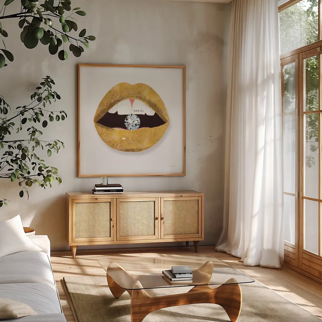 Gold Lips II by Mercedes Lopez Charro. Shown in a natural wood frame in a cozy modern living room. Available as an archival giclee rolled canvas, fine art paper, or poster print. SKU 67091a.
