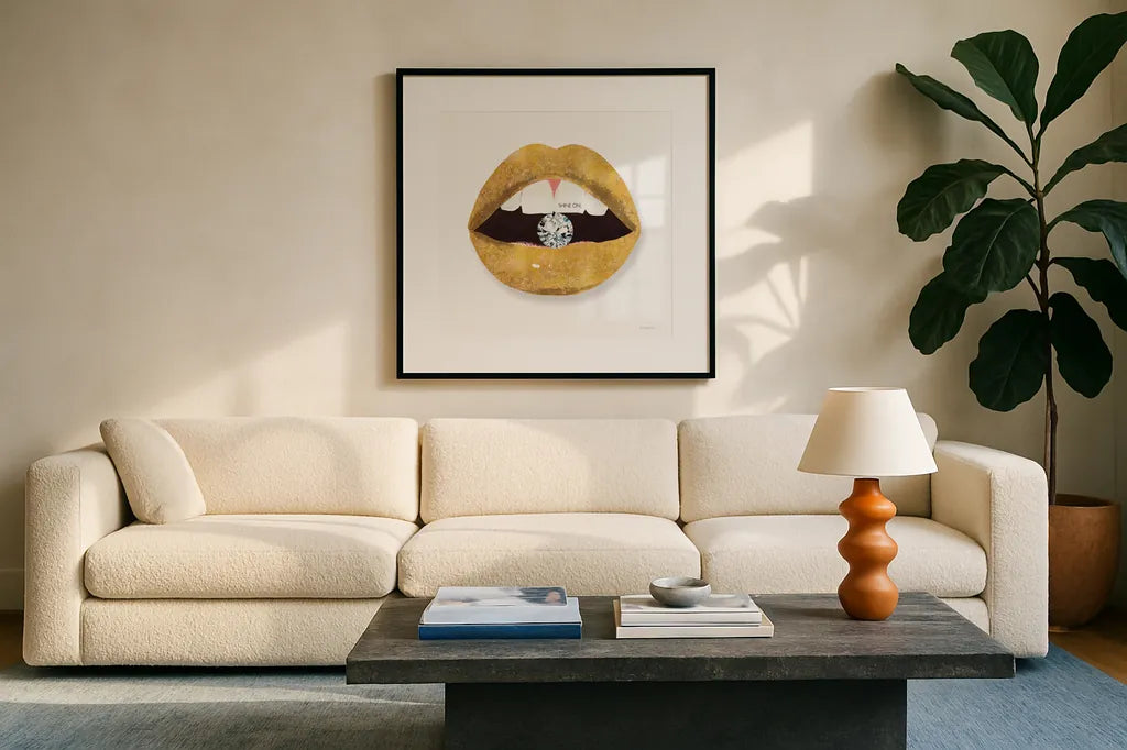 Gold Lips II by Mercedes Lopez Charro. Displayed in a glass frame with matte in a clean modern living room. Available as an archival giclee rolled canvas, fine art paper, or poster print. SKU 67091a.