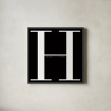 H is for Hooray by Mercedes Lopez Charro. Shown in a sleek black glass frame for a contemporary gallery look. Available as an archival giclee rolled canvas, fine art paper, or poster print. SKU 64141a.
