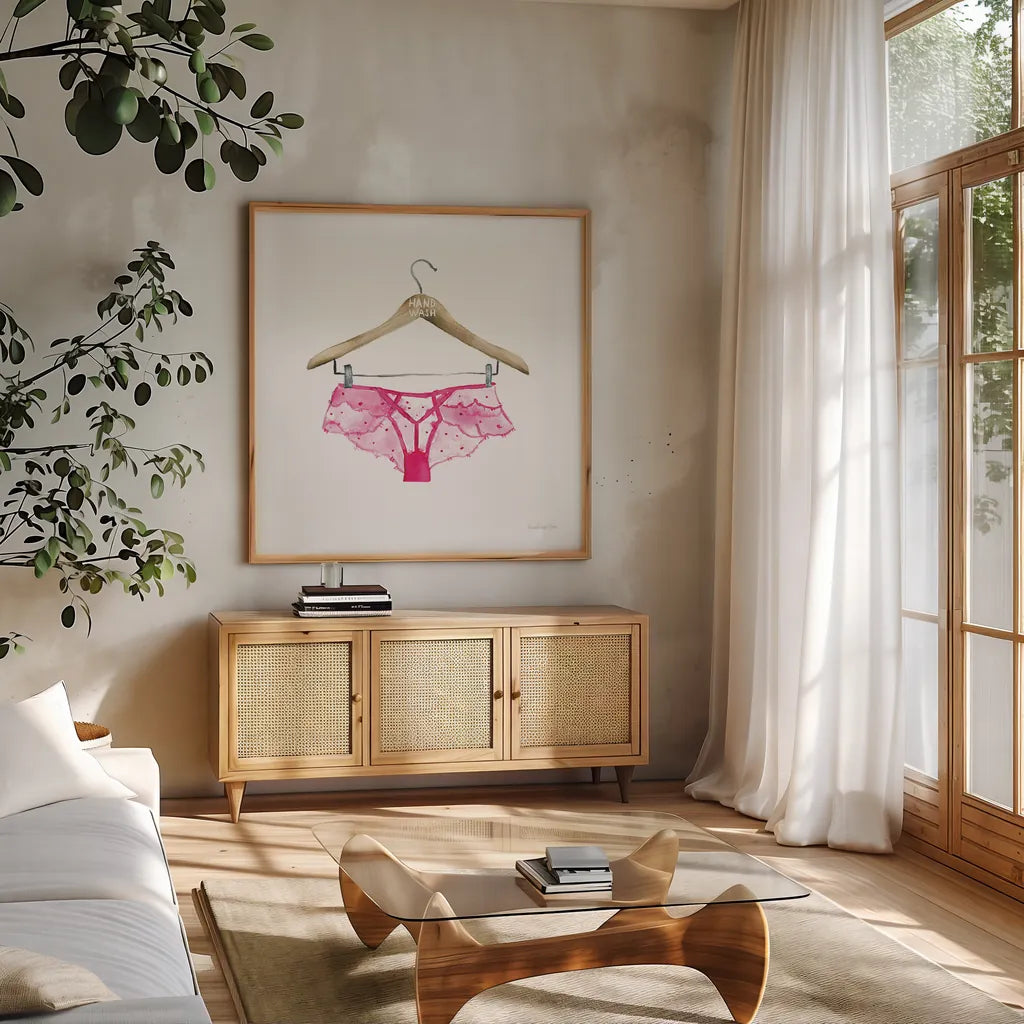 Hand Wash IV by Mercedes Lopez Charro. Shown in a natural wood frame in a cozy modern living room. Available as an archival giclee rolled canvas, fine art paper, or poster print. SKU 75483a.